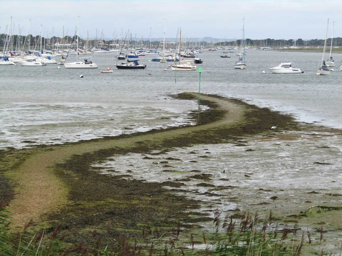 Mudflats and a causeway at Westlands, Birdham, with Chichester Harbour at low tide