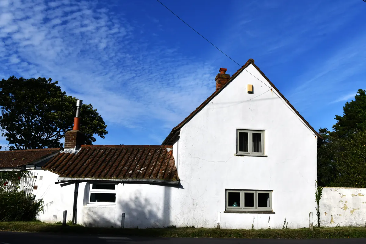The White Cottage, an old whitewashed house in Birdham