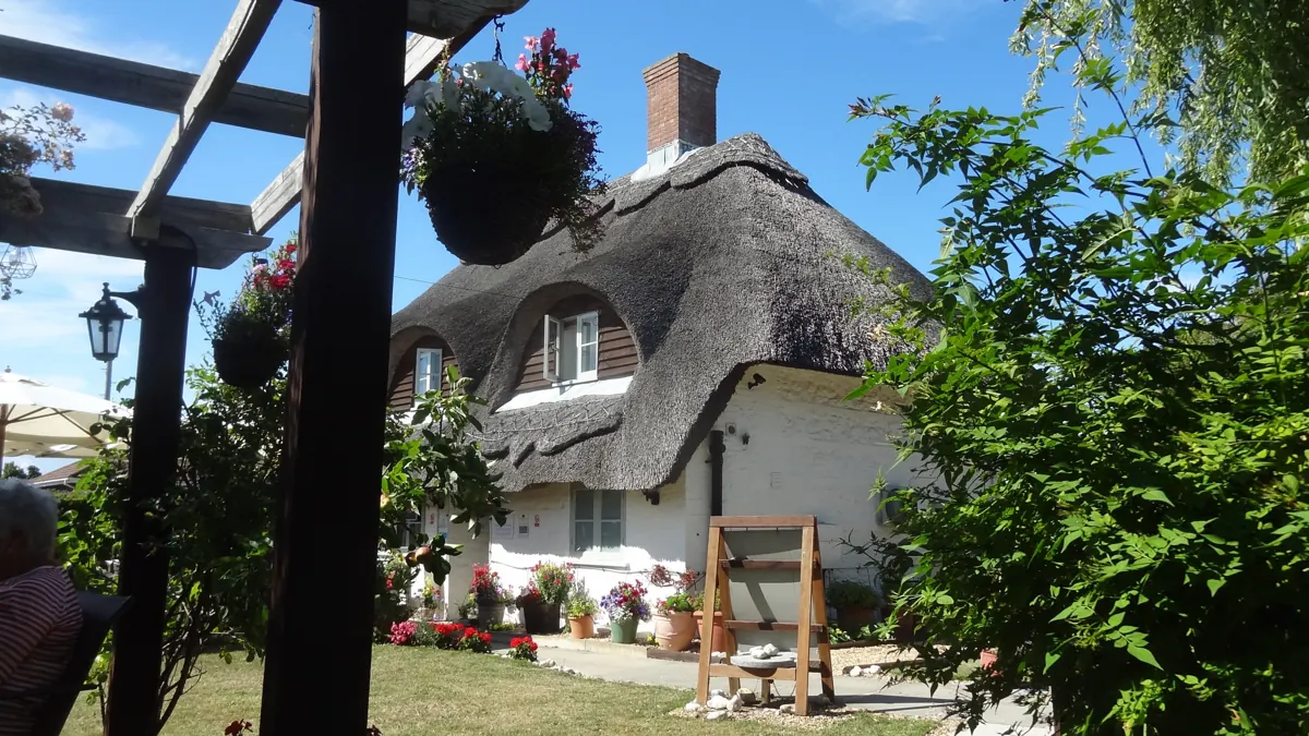 Bracklesham Bay Tea Rooms, a thatched cafe with a garden